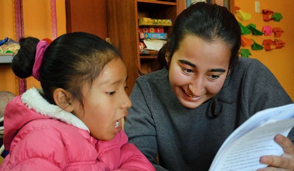 volunteer teaching basic courses to kids