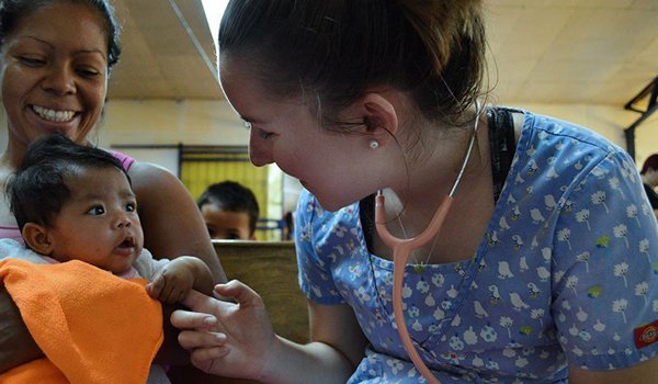 doctor palying wth baby child