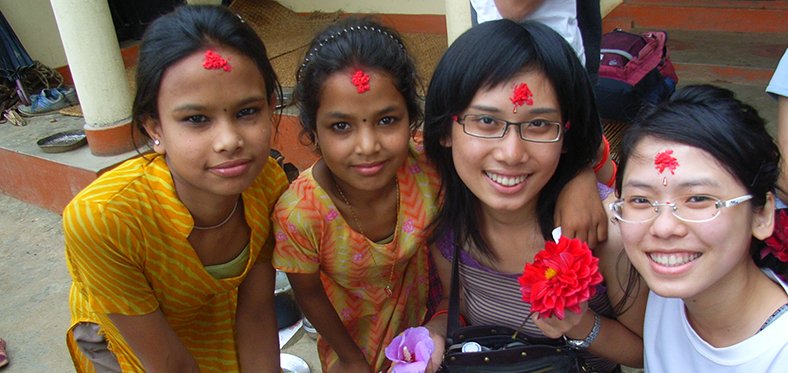 volunteers welcomed by host family