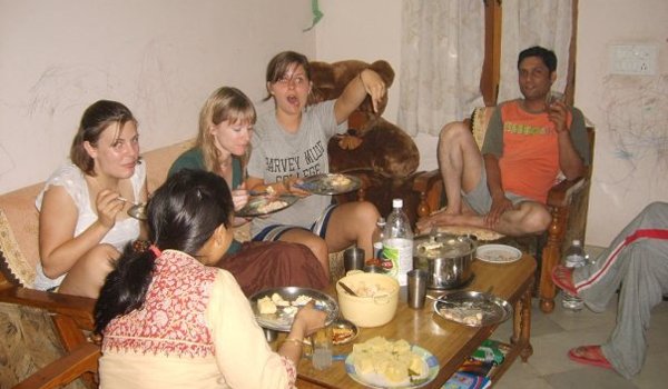 volunteer having meal in indian host family