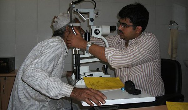 indian doctor checkup patient in hospital