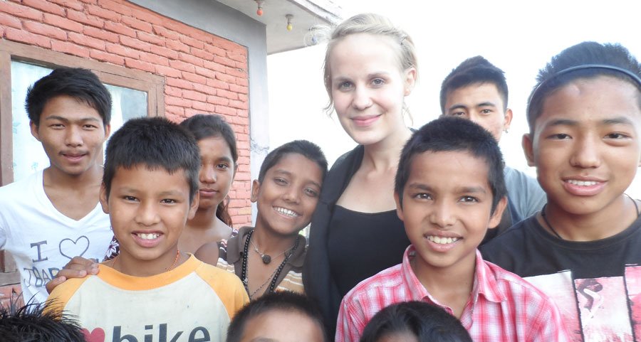 volunteer with kids in orphanage of nepal