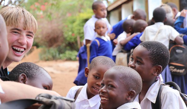 volunteer talking with orphanage in uganda.jpg