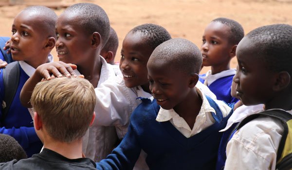 child playing in uganda orphanage